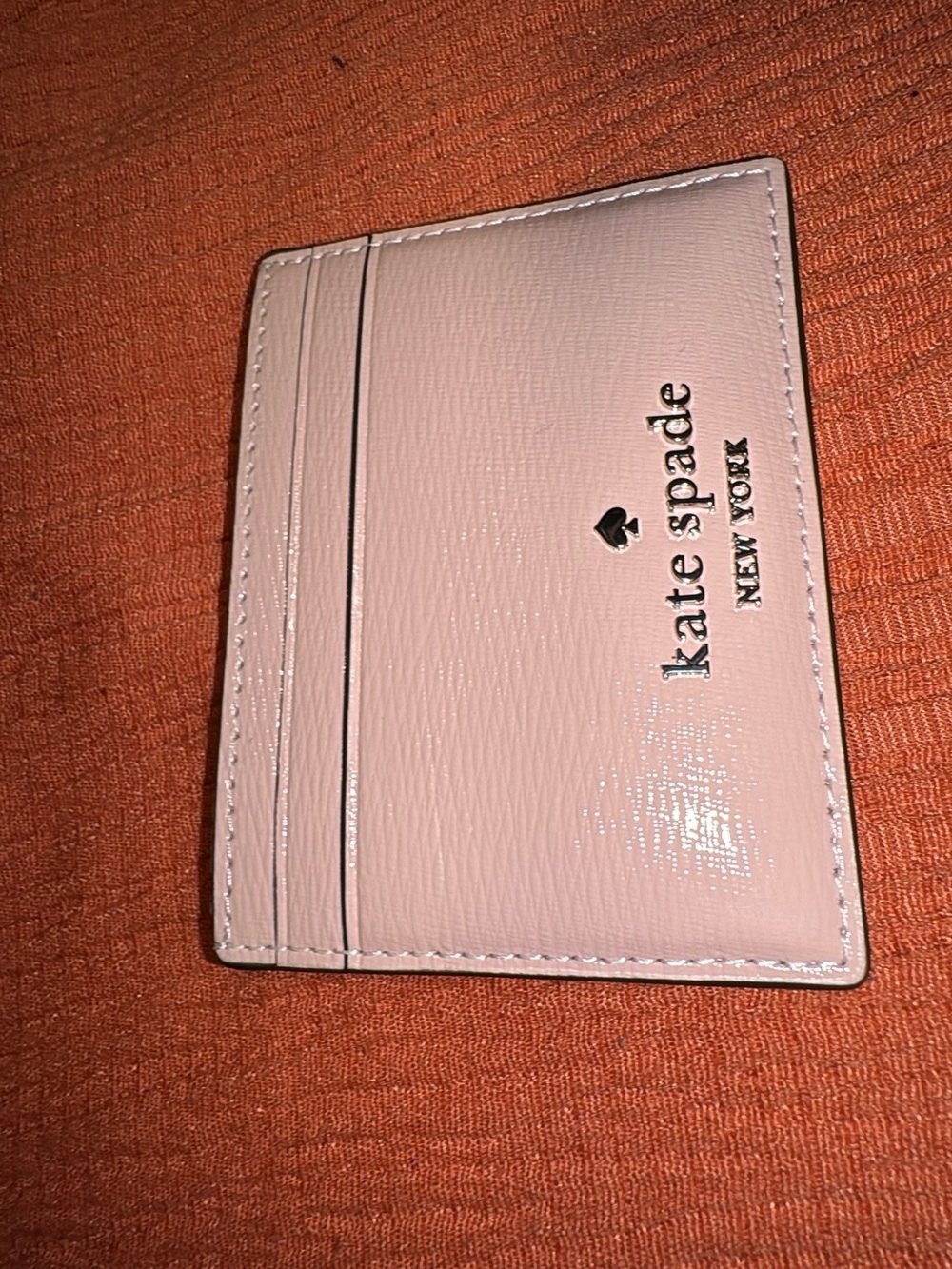 kate spade pale pink glossy card wallet